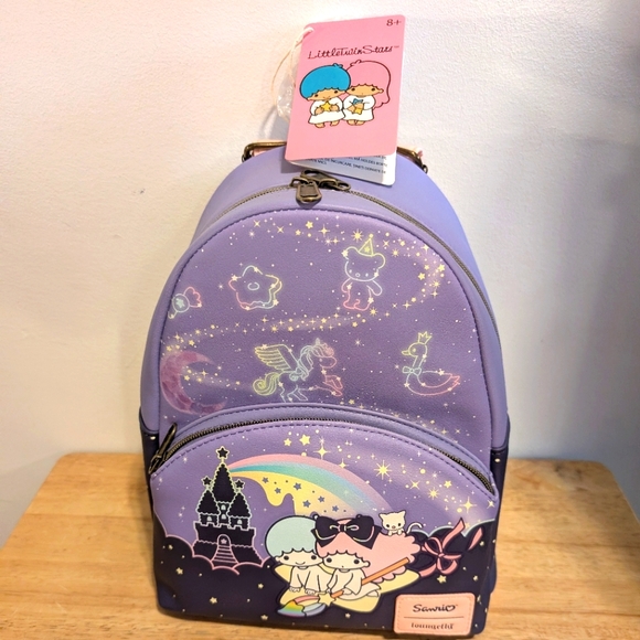 Sanrio Handbags - Sanrio Purple Mini Backpack with Sparkly Castle Design